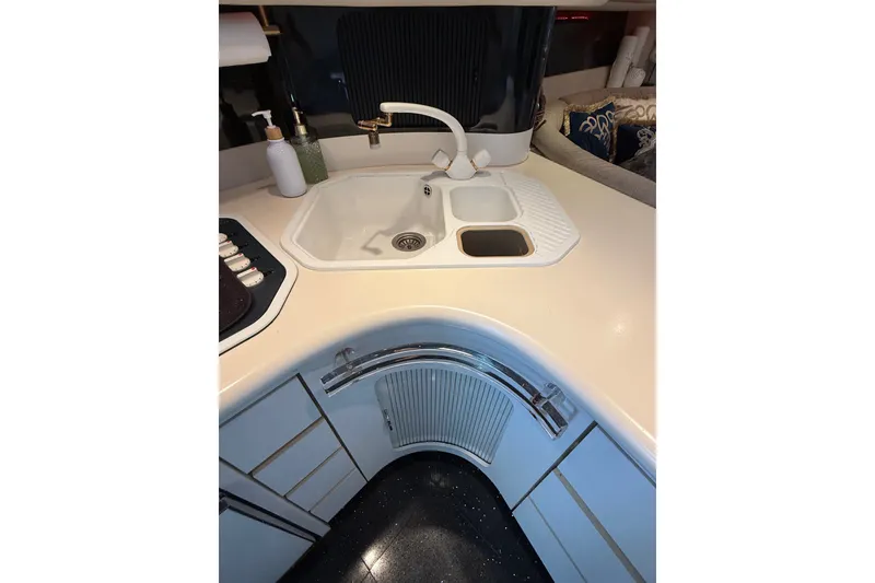 Slide: The Image of Luxurious kitchen area in 1991 Sea Ray 630 Super Sun Sport yacht. - 35