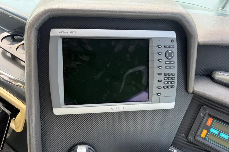 Slide: The Image of Garmin GPSmap 4212 on 1991 Sea Ray 630 Super Sun Sport dashboard. - 26