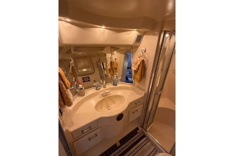 Slide: The Image of Luxurious bathroom interior of 1991 Sea Ray 630 Super Sun Sport yacht. - 45