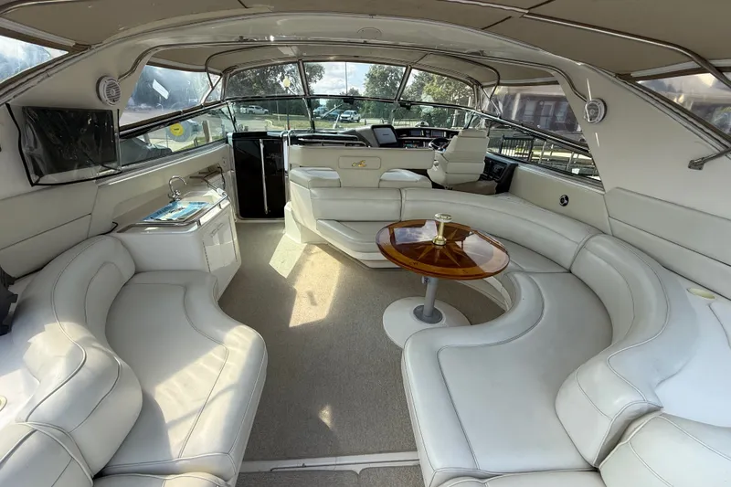 Slide: The Image of Luxurious interior of a 1991 Sea Ray 630 Super Sun Sport yacht with plush seating. - 15