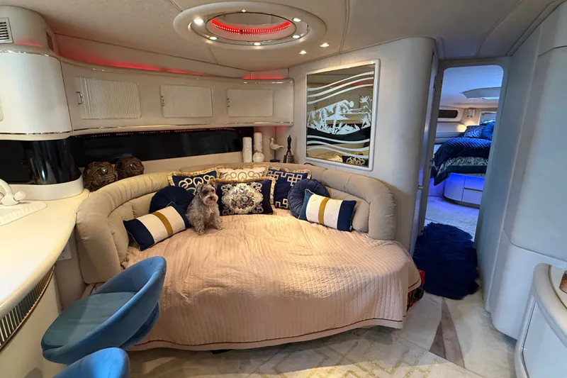 Slide: The Image of Luxurious interior of a 1991 Sea Ray 630 Super Sun Sport yacht with cozy seating and decor. - 38