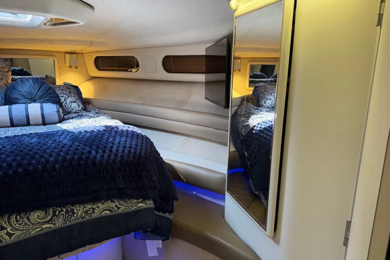 Slide: The Image of Luxurious cabin interior of a 1991 Sea Ray 630 Super Sun Sport yacht. - 43