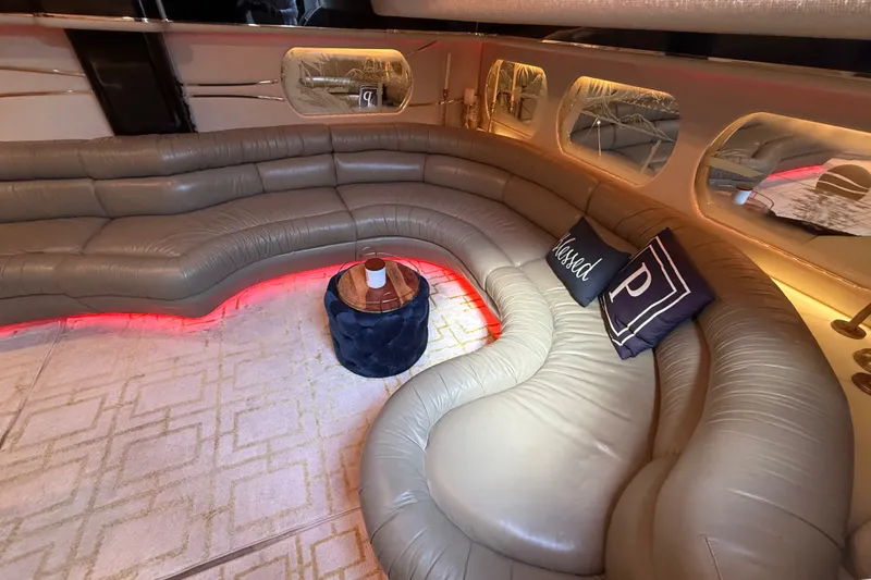 Slide: The Image of Luxurious interior of 1991 Sea Ray 630 Super Sun Sport yacht with plush seating. - 29