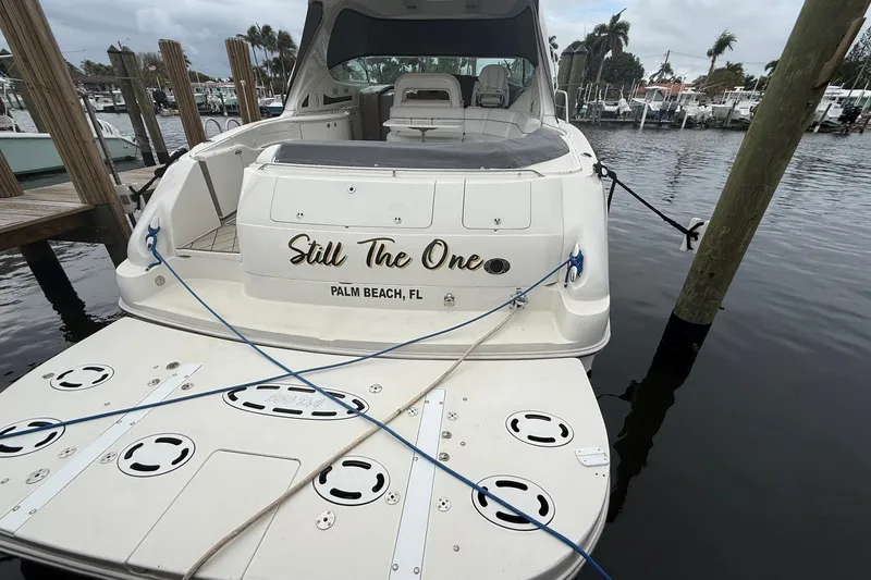 Slide: The Image of 2004 Sea Ray 550 Sundancer docked in Palm Beach, Florida marina. - 42