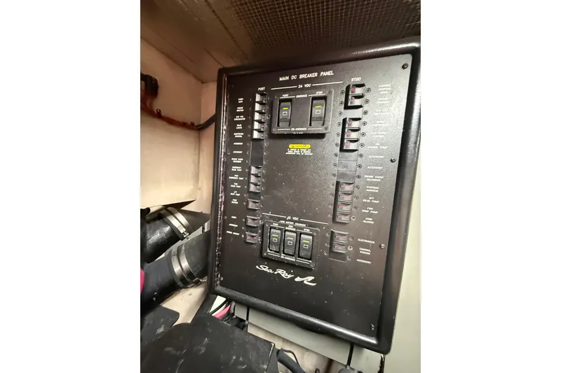 Slide: The Image of Electrical breaker panel on a 2004 Sea Ray 550 Sundancer yacht. - 70