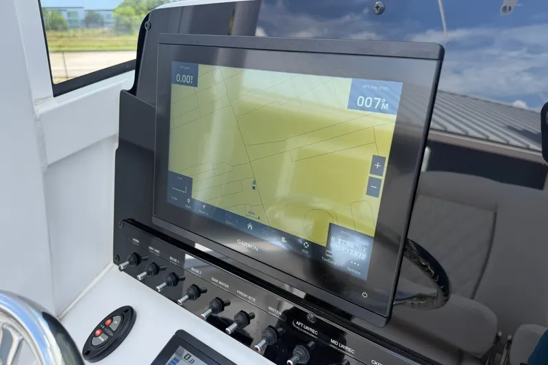 Slide: The Image of Garmin navigation display on 2026 Sea Hunt Gamefish 25 boat dashboard. - 19