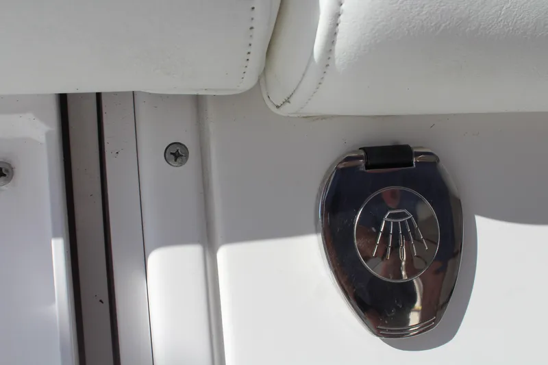 Slide: The Image of Close-up of a 2006 Pro-Line 32 Express boat detail with chrome fixture. - 20