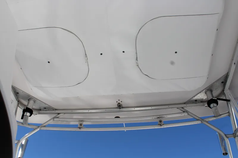 Slide: The Image of View of the roof of a 2006 Pro-Line 32 Express boat with blue sky in the background. - 50