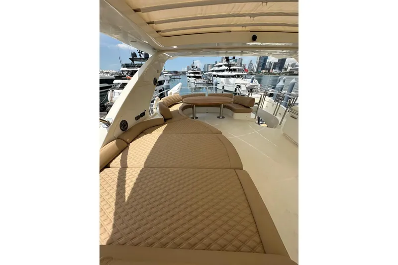 Slide: The Image of Luxurious 2010 Azimut 75 yacht with spacious deck and elegant seating in marina. - 20
