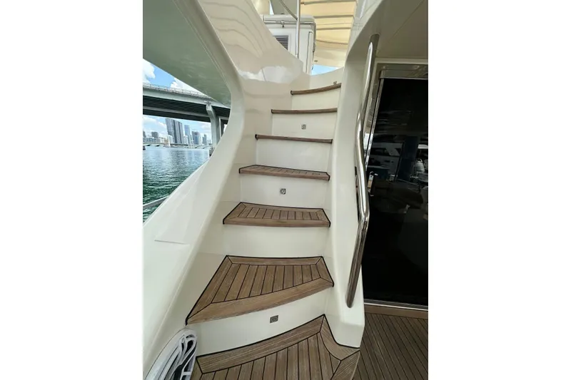 Slide: The Image of Staircase on 2010 Azimut 75 yacht with wooden steps and sleek design. - 21