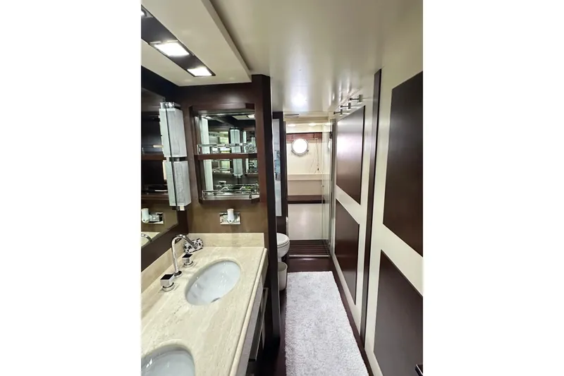 Slide: The Image of Luxurious bathroom interior of 2010 Azimut 75 yacht with dual sinks and elegant finishes. - 10