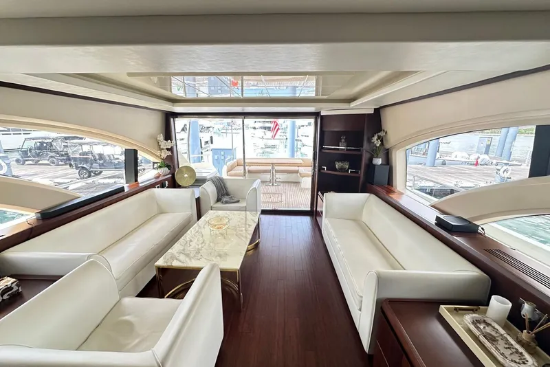 Slide: The Image of Luxurious interior of 2010 Azimut 75 yacht with elegant white seating and wooden flooring. - 13