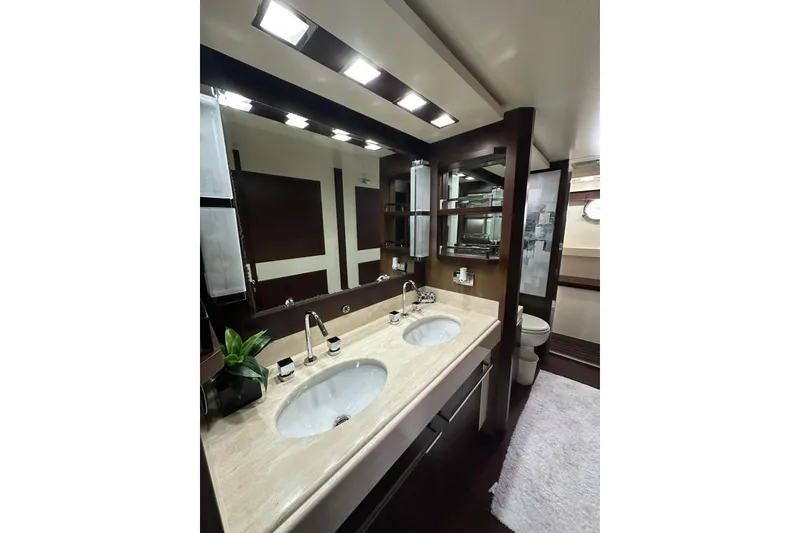 Slide: The Image of Luxurious bathroom interior of 2010 Azimut 75 yacht with dual sinks and modern fixtures. - 9