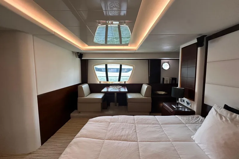 Slide: The Image of Luxurious interior of 2010 Azimut 75 yacht with elegant seating and bedding. - 6