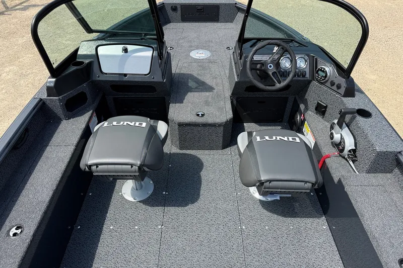 Slide: The Image of Interior of 2027 Lund 1700 Adventure Sport boat with dual seats and steering console. - 6