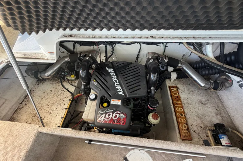 Slide: The Image of Engine compartment of a 2006 Crownline 290 CR boat with MerCruiser 496 engine. - 32