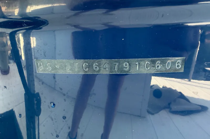Slide: The Image of Hull identification number on a 2006 Crownline 290 CR boat. - 33