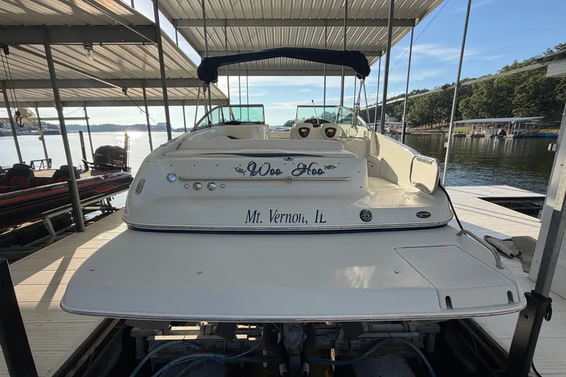 Slide: The Image of 2006 Crownline 290 CR boat docked, rear view, with "Woo Hoo" and "Mt. Vernon, IL" text. - 3