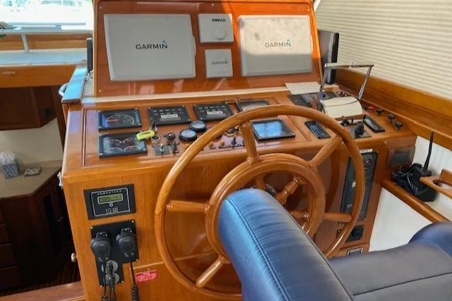 Slide: The Image of Helm of 2001 Grand Banks 49 Eastbay SX with Garmin navigation systems. - 7