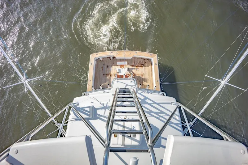 Slide: The Image of Aerial view of 2003 Viking 65 EB yacht's deck and ocean surroundings. - 36