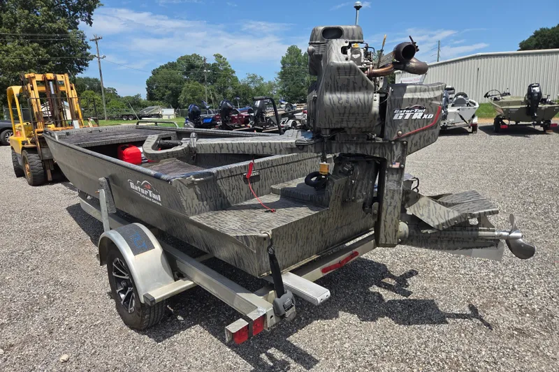 Slide: The Image of 2022 Gator Tail Extreme series boat on trailer, outdoor setting, clear sky. - 9