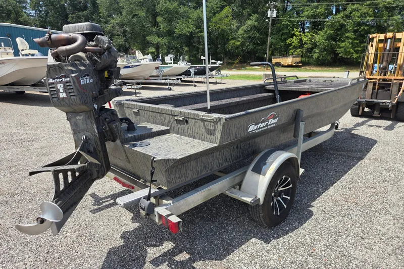 Slide: The Image of 2022 Gator Tail Extreme Series boat on trailer, parked outdoors. - 6