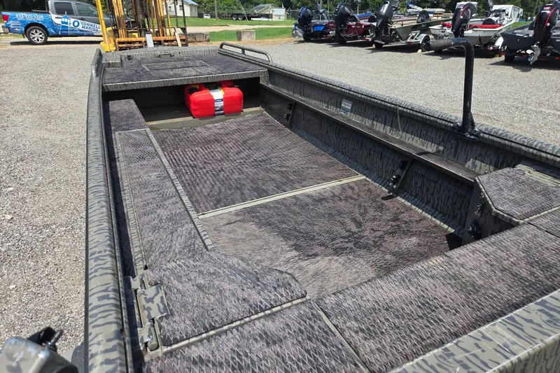 Slide: The Image of 2022 Gator Tail Extreme series boat with camo pattern and red fuel tank. - 14