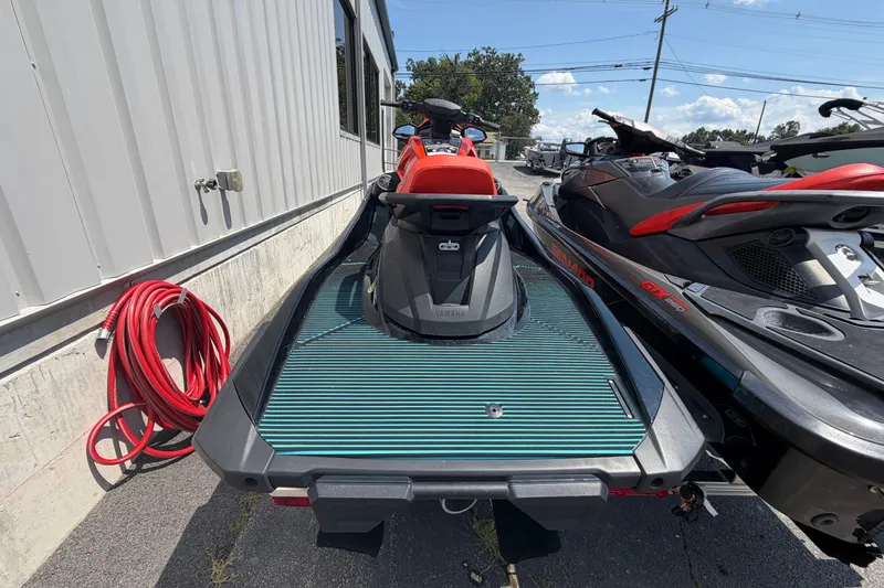 Slide: The Image of 2022 Yamaha WaveRunner VX Cruiser HO parked beside a building with a red hose. - 4