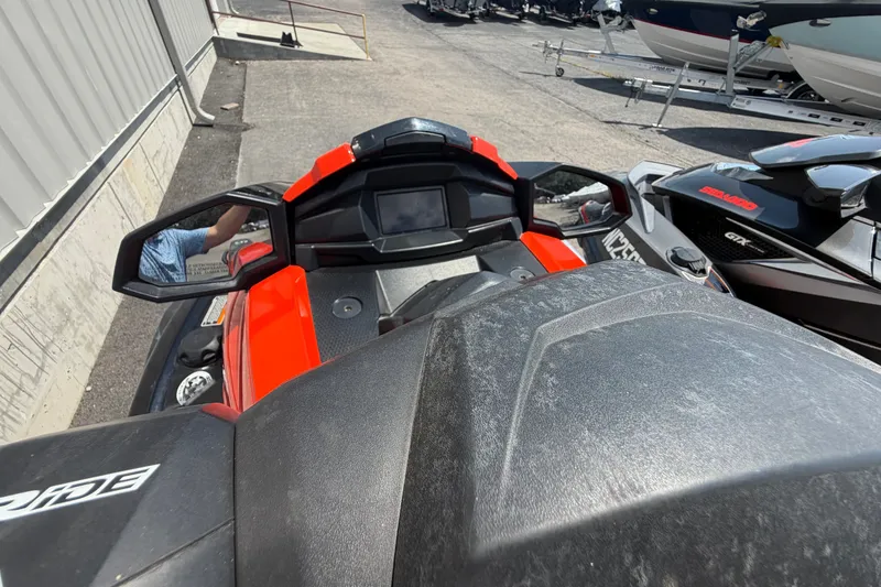 Slide: The Image of 2022 Yamaha WaveRunner VX Cruiser HO, red and black, parked outdoors. - 7