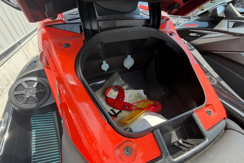 Slide: The Image of 2022 Yamaha WaveRunner VX Cruiser HO storage compartment with safety gear and accessories. - 6