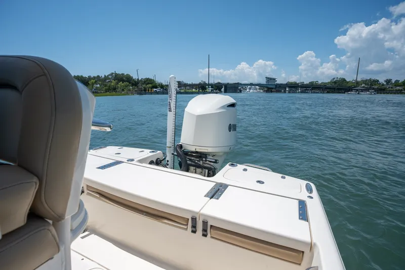 Slide: The Image of 2019 Scout 251 XSS boat on water, featuring Yamaha outboard motor. - 9