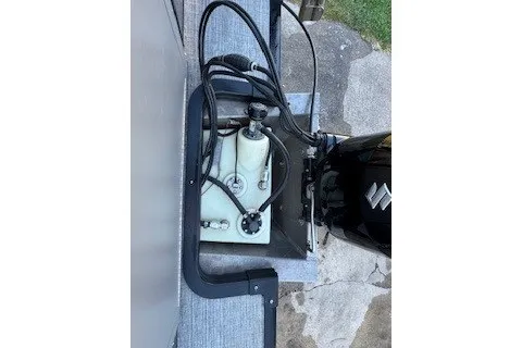 Slide: The Image of 2023 Angler Qwest 22' Pro Family Fish boat engine and fuel system components. - 30
