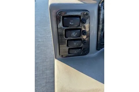 Slide: The Image of Control panel of 2023 Angler Qwest 22' Pro Family Fish boat. - 31