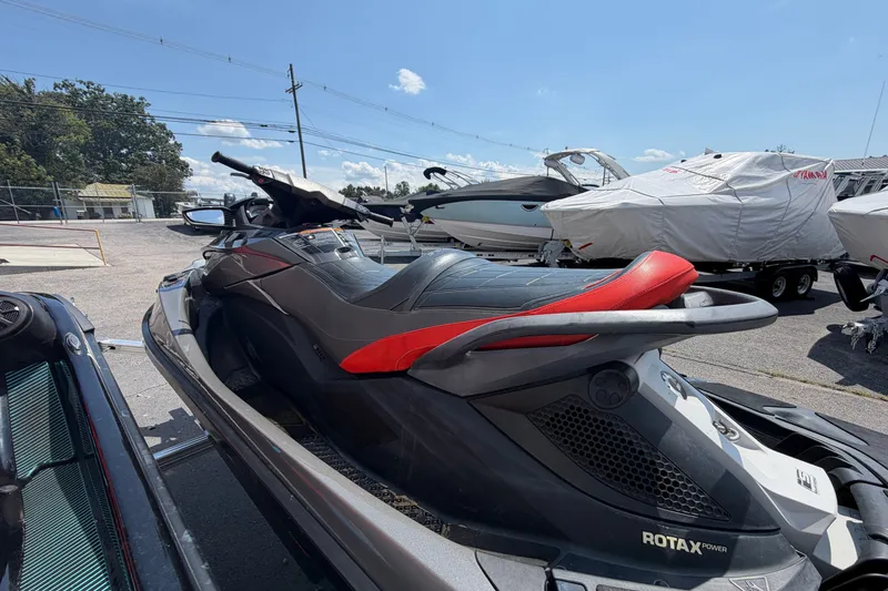 Slide: The Image of 2014 Sea-Doo GTX Limited iS 260 jet ski parked outdoors. - 6