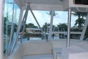 Slide: The Image of 1996 Ocean 53 Super Sport yacht interior with marina view through windows. - 11
