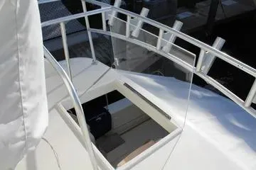 Slide: The Image of 1996 Ocean 53 Super Sport yacht deck with open hatch and railing. - 13