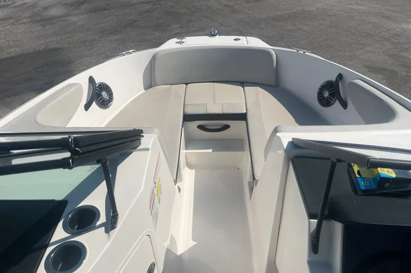 Slide: The Image of 2023 Sea Ray SPX 210 Outboard boat interior with seating and speakers. - 5