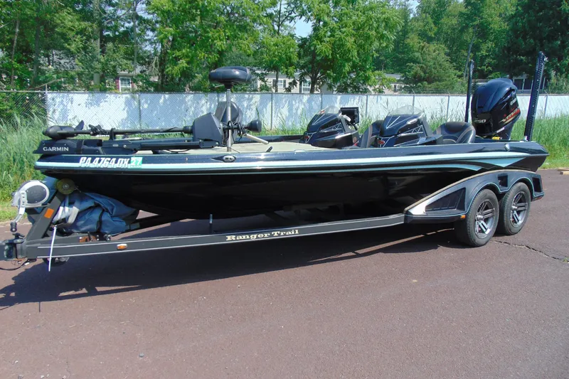 The Image of 2016 Ranger Z521L fishing boat on trailer, parked outdoors. - 1