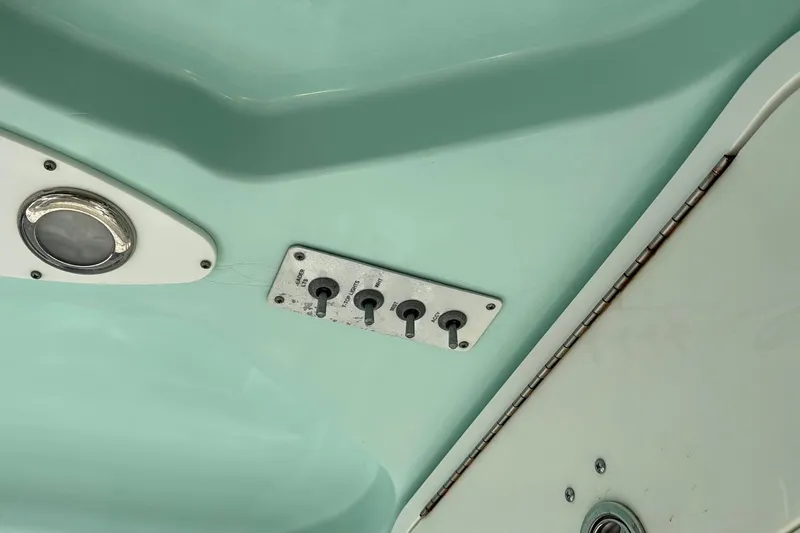Slide: The Image of Control panel and porthole on 2013 Sea Fox 286 Center Console boat. - 26