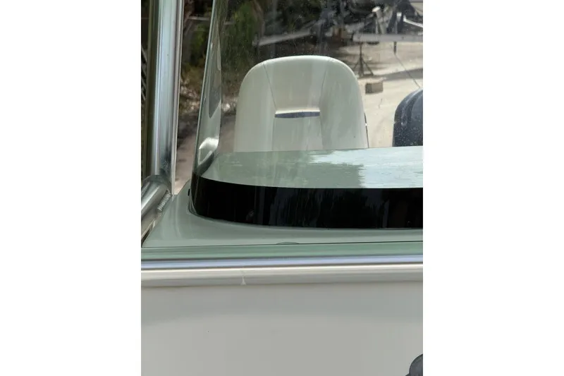 Slide: The Image of 2013 Sea Fox 286 Center Console boat windshield and seating detail. - 16