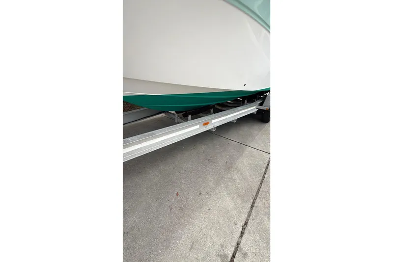 Slide: The Image of 2013 Sea Fox 286 Center Console boat on trailer, partial view. - 35