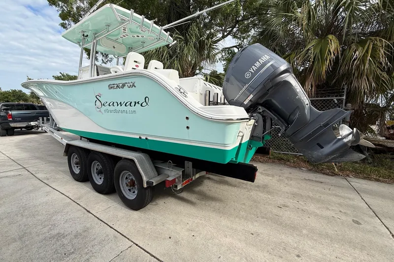 The Image of 2013 Sea Fox 286 Center Console boat on trailer with Yamaha outboard motor. - 0