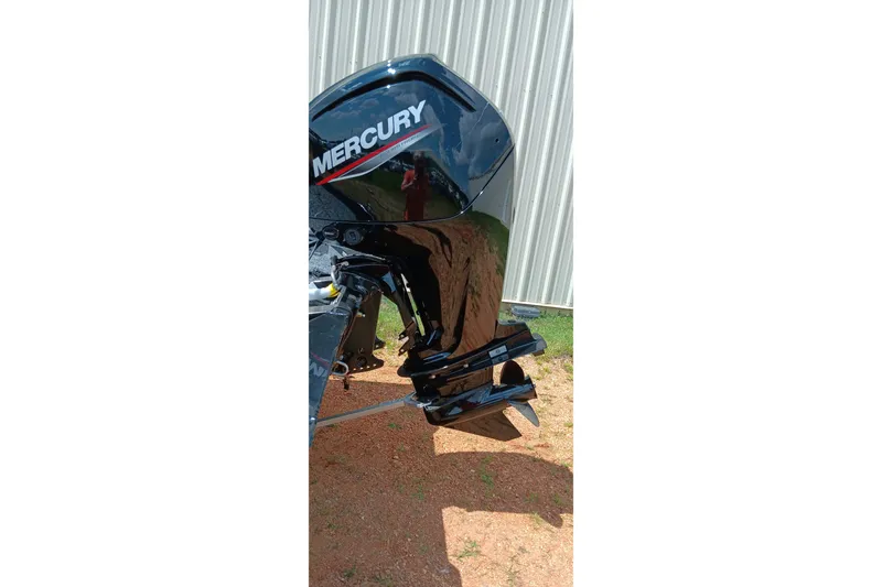 Slide: The Image of Outboard motor of a 2027 Tracker Pro Team 175 boat, featuring a Mercury engine. - 14