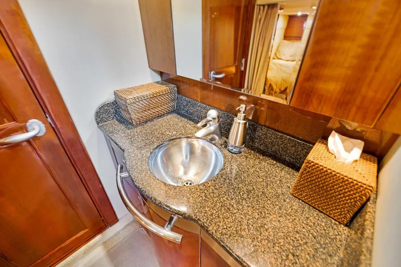 Slide: The Image of Luxurious bathroom interior of 2007 Sea Ray 48 Sundancer yacht with granite countertop. - 18