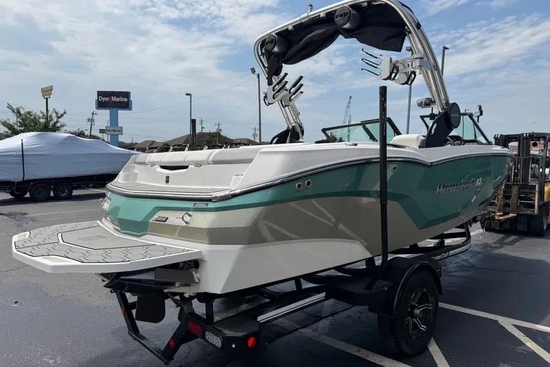 Slide: The Image of 2022 MasterCraft NXT20 boat on trailer at Dyer Marine dealership. - 3