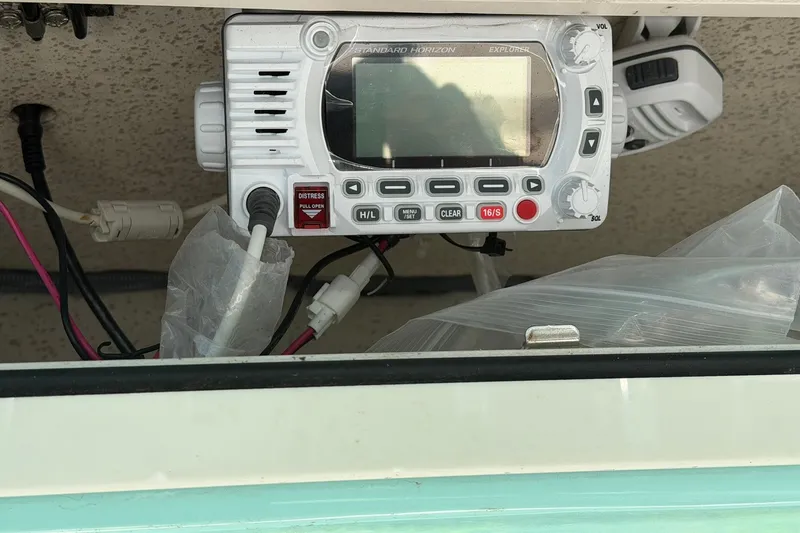 Slide: The Image of Standard Horizon marine radio on a 2022 Carolina Skiff 26 Ultra Elite boat. - 22