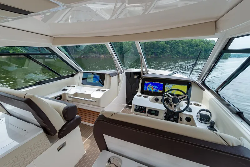 Slide: The Image of Manufacturer Provided Image: Luxurious interior of 2026 Regal LS36 yacht with advanced navigation systems. - 19