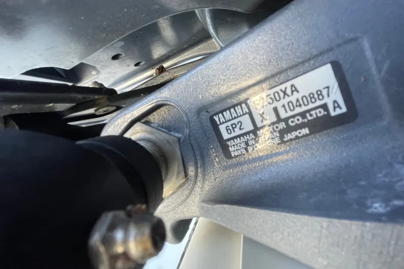 Slide: The Image of Close-up of Yamaha motor part on 2001 Hydra-Sports Vector 2800 WA boat. - 53