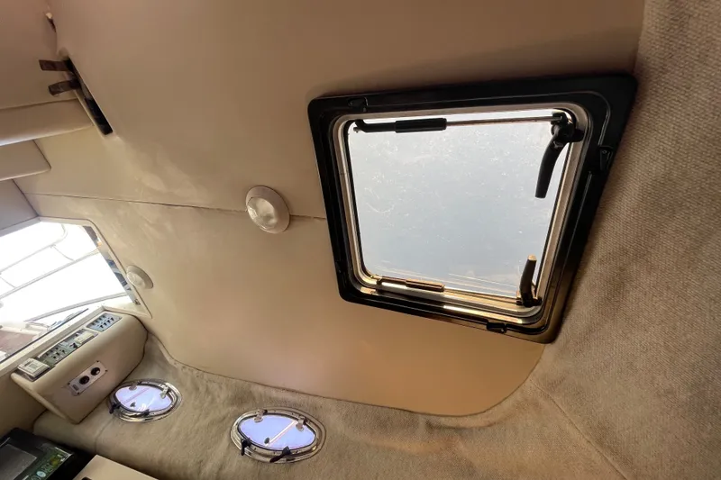 Slide: The Image of Interior cabin view of 2001 Hydra-Sports Vector 2800 WA with portholes and hatch. - 40