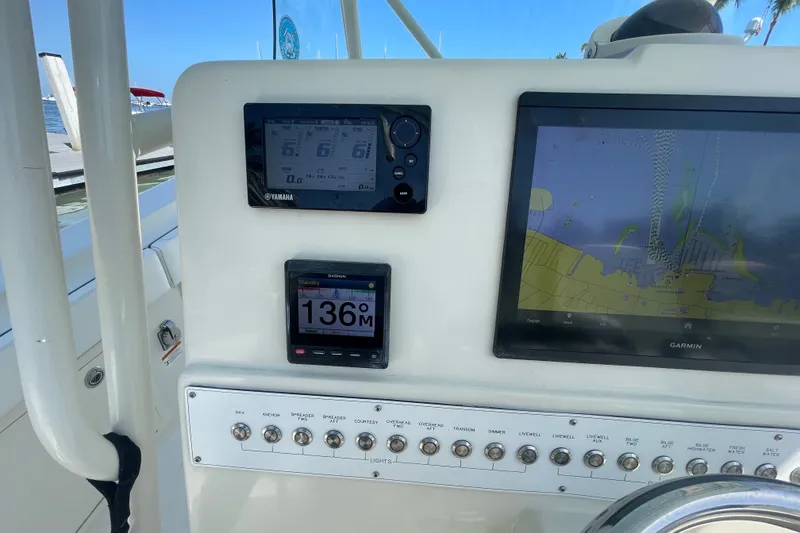 Slide: The Image of Control panel of a 2004 Hydra-Sports Vector 3300 CC with Garmin navigation display. - 23